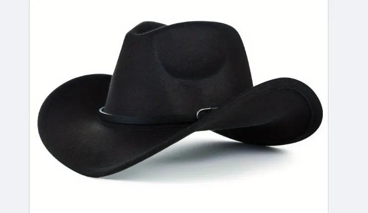 Brown leather velvet curved edge Western cowboy hat with a conical crown on a table.