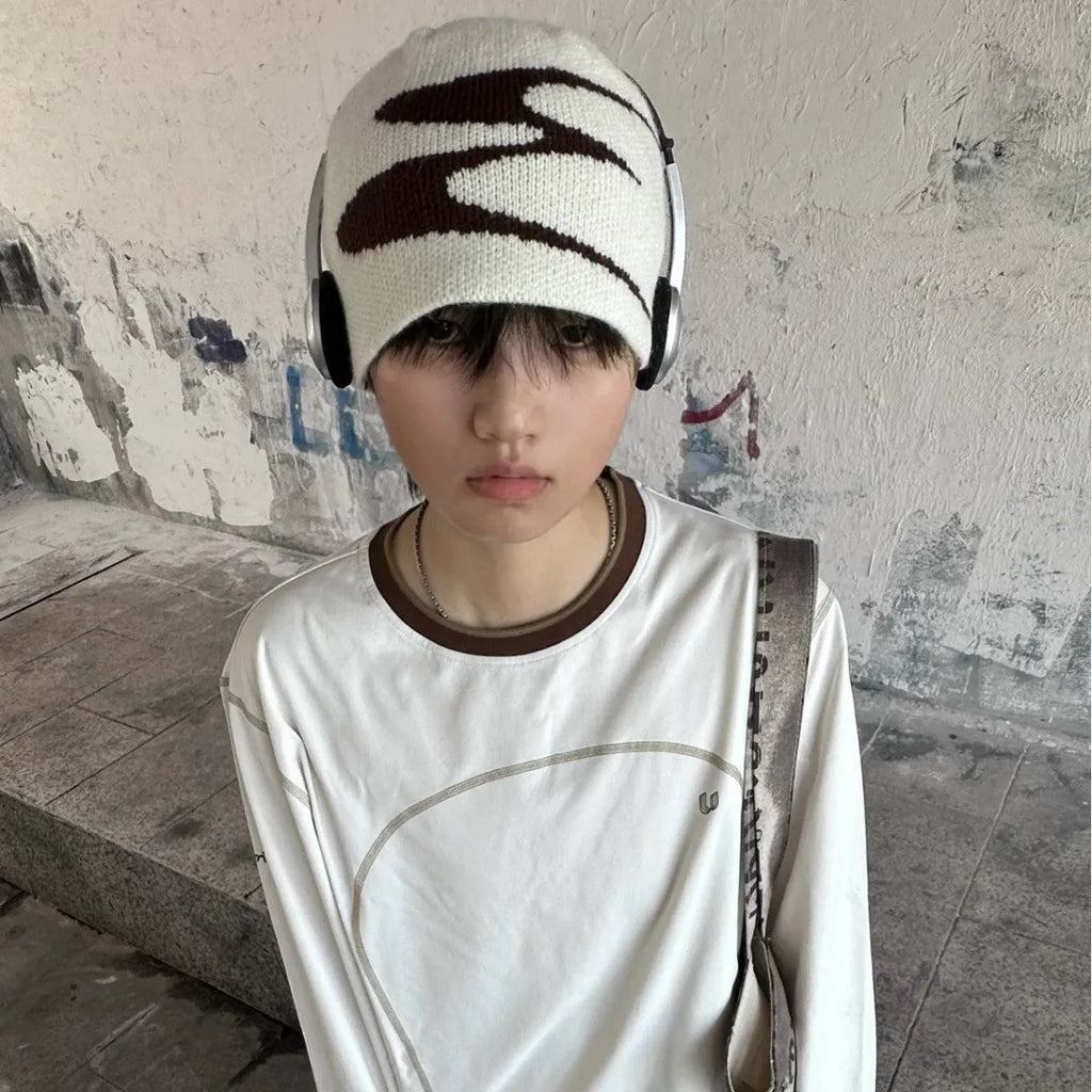 Acrylic knitted beanie hat for men and women in black, grey or white colours with thermal warmth