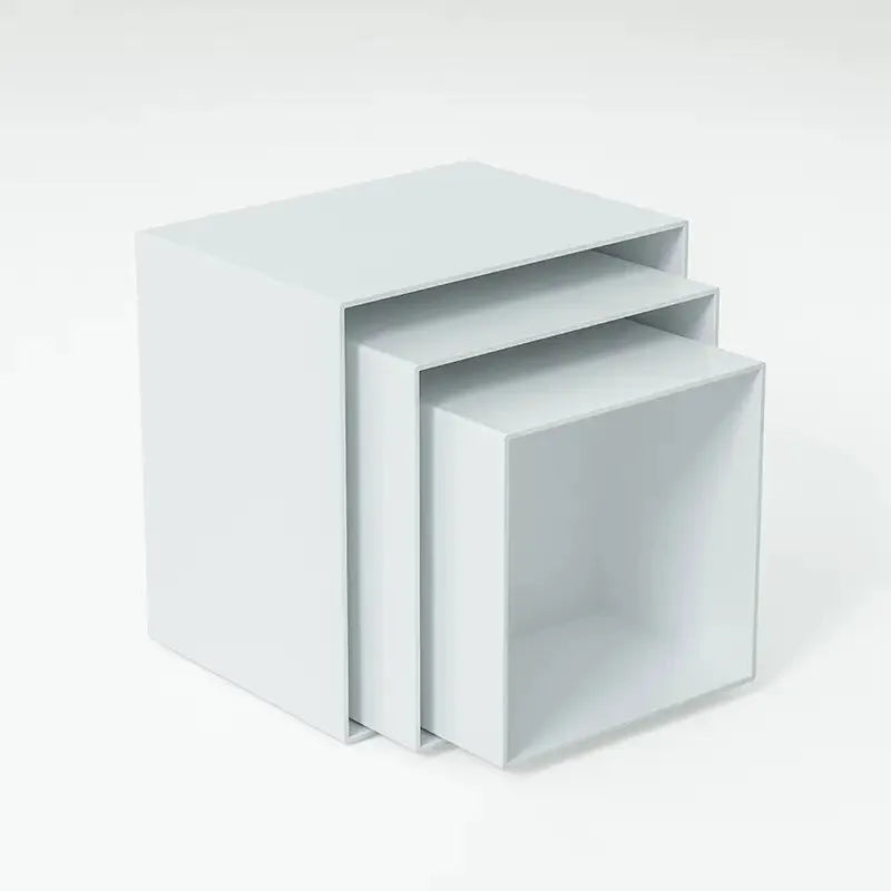 White plastic six-piece stacking dessert table display stand set for tiered bakery presentation