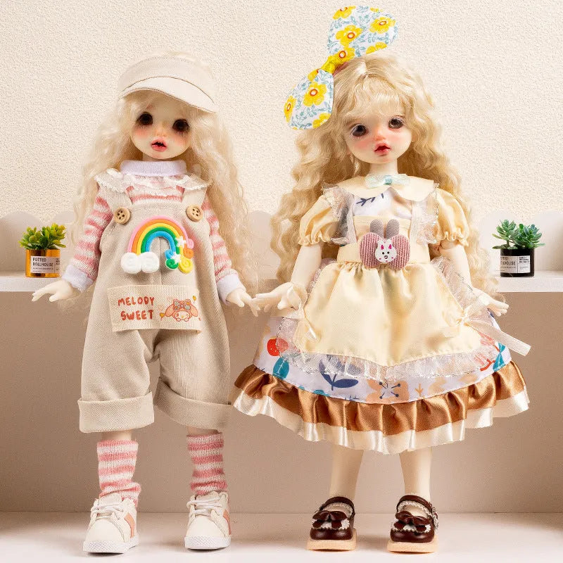 Printed cloth doll clothes for fashion dolls in various colourful patterns sold separately without dolls