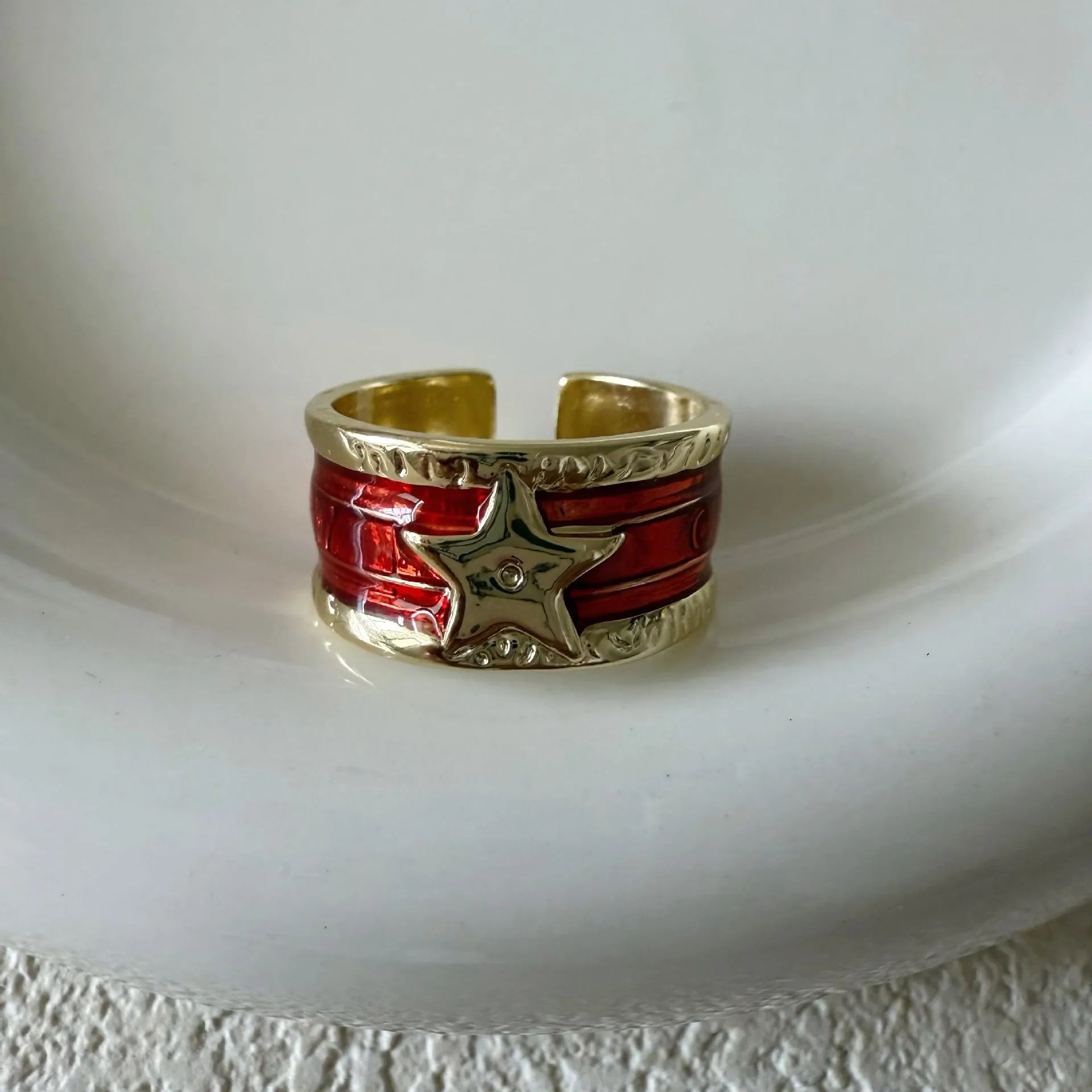Adjustable geometric copper drop oil ring with a distressed retro finish.