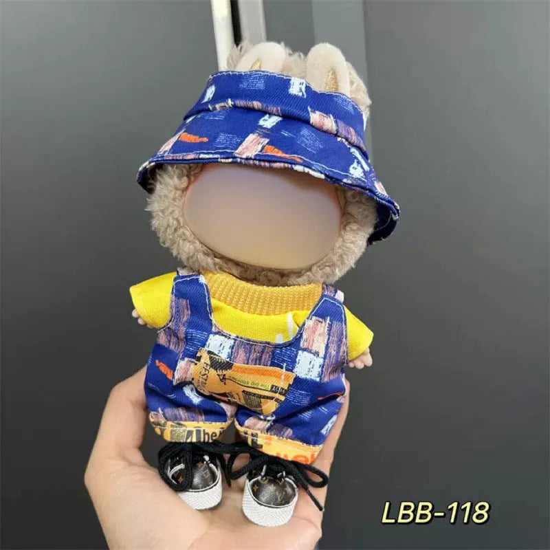 Plastic doll clothing costume for 17cm tall vinyl figurines on a display stand.