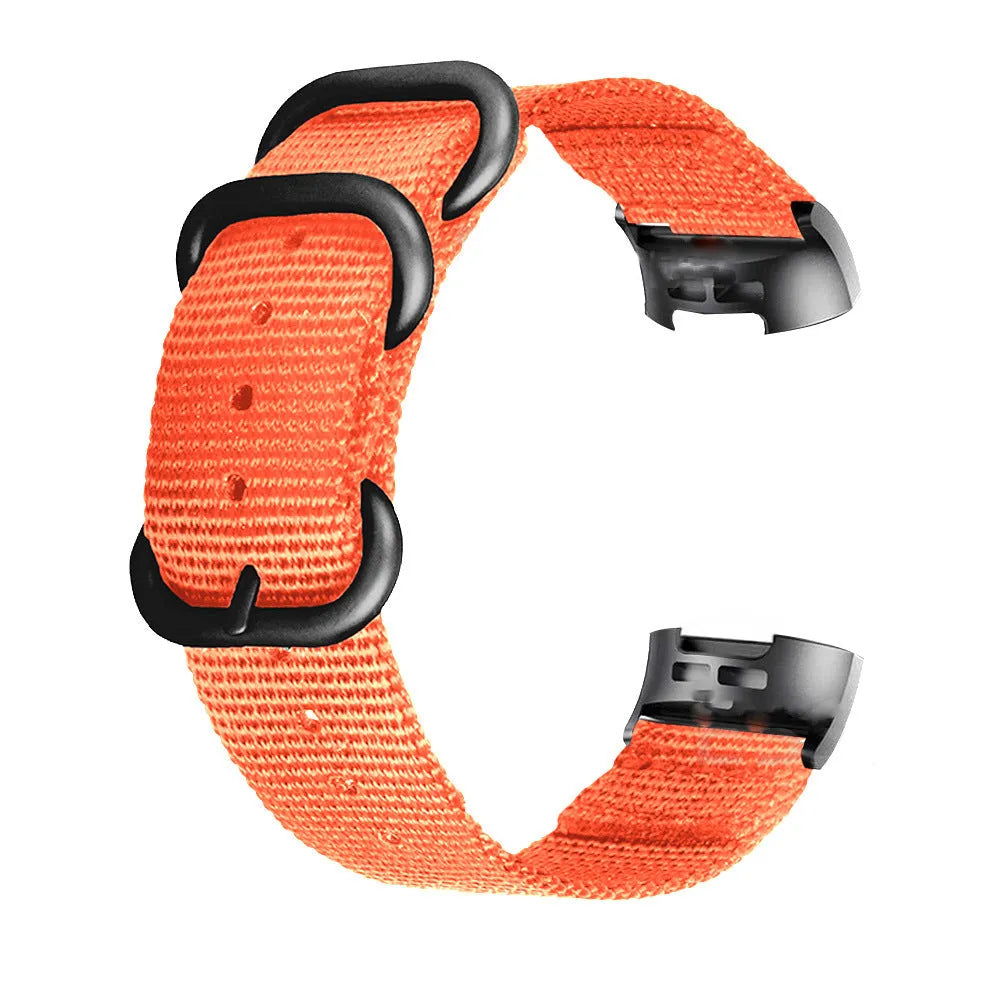 Nylon three-ring buckle replacement strap for Fitbit Charge fitness tracker in multiple colours.