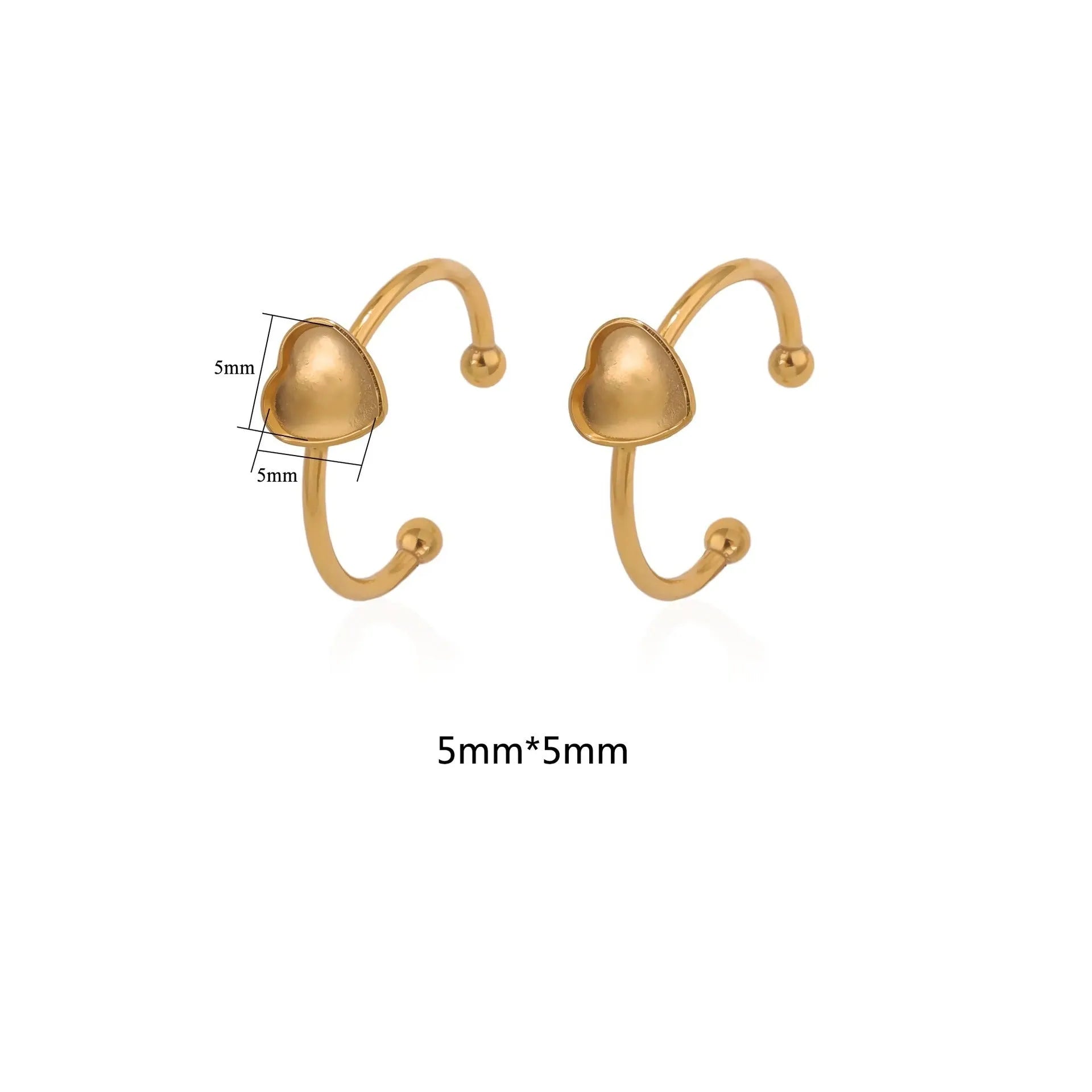 Assortment of golden electroplated stainless steel ring settings and DIY jewellery components in various shapes.