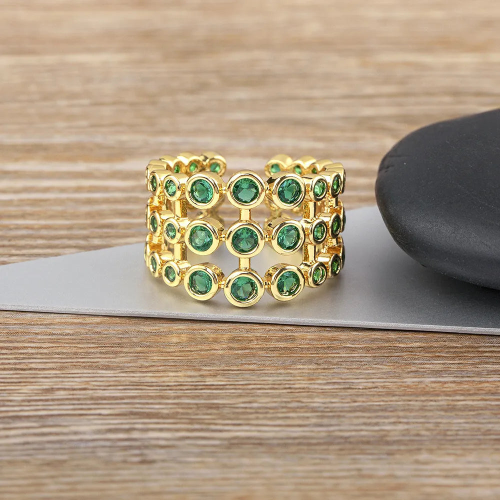 Copper ring with 18K gold three-layer plating and green zircon detailing on wide band