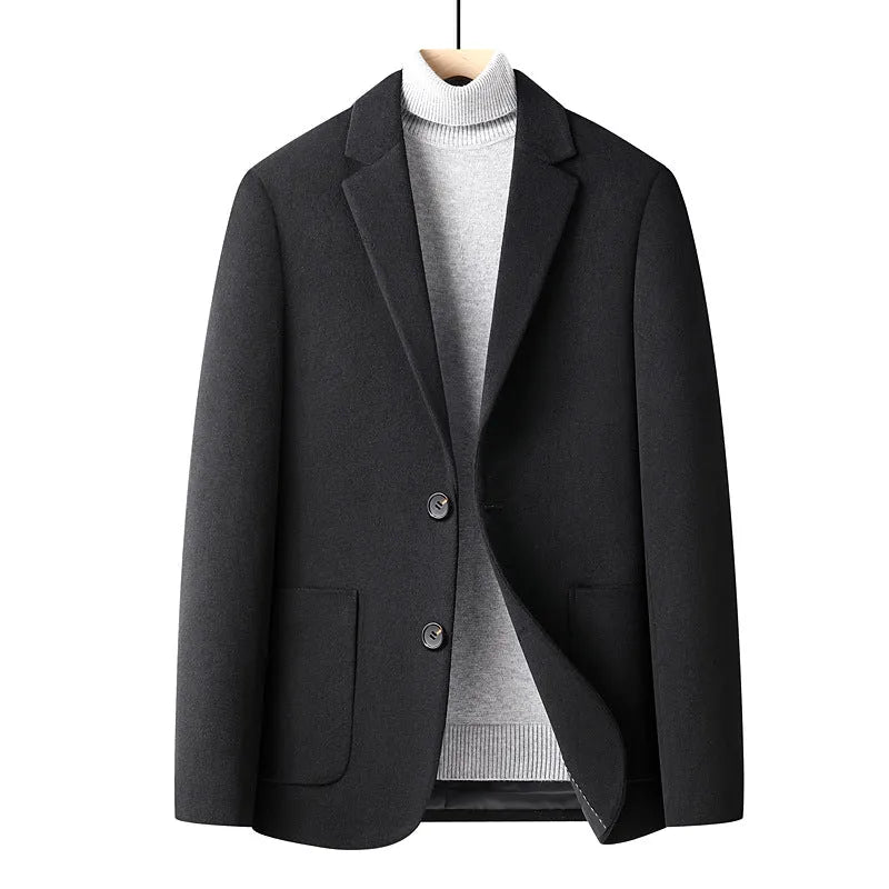 Men's slim-fit wool suit jacket in grey, shown on a hanger.