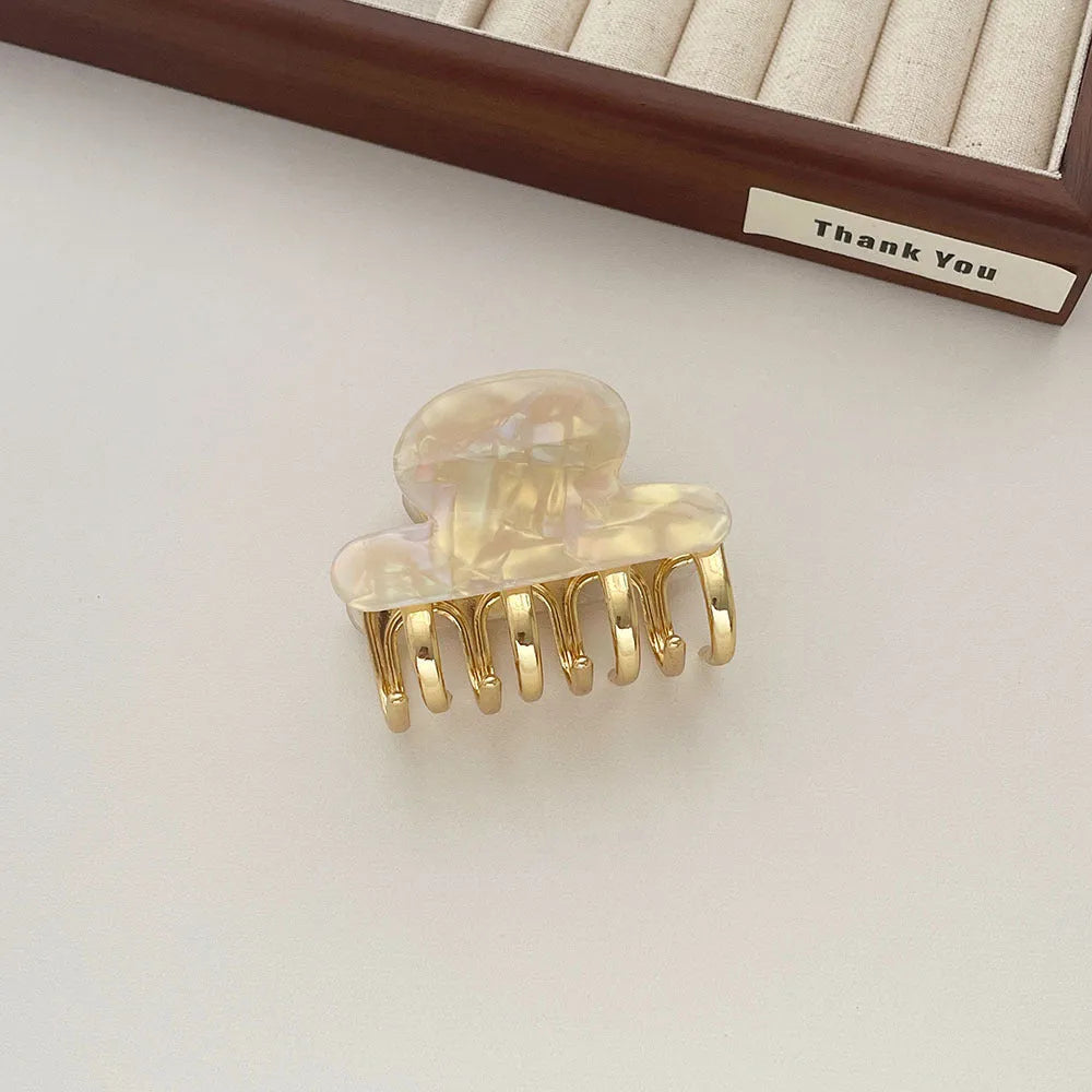 Women's retro acetate barrettes with metal grip in beige, white, ink, or leopard print colours