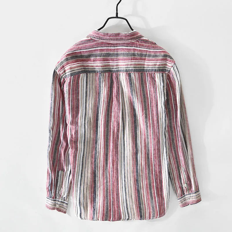 A man's casual red and grey striped linen shirt with long sleeves, laid flat to show its loose fit.