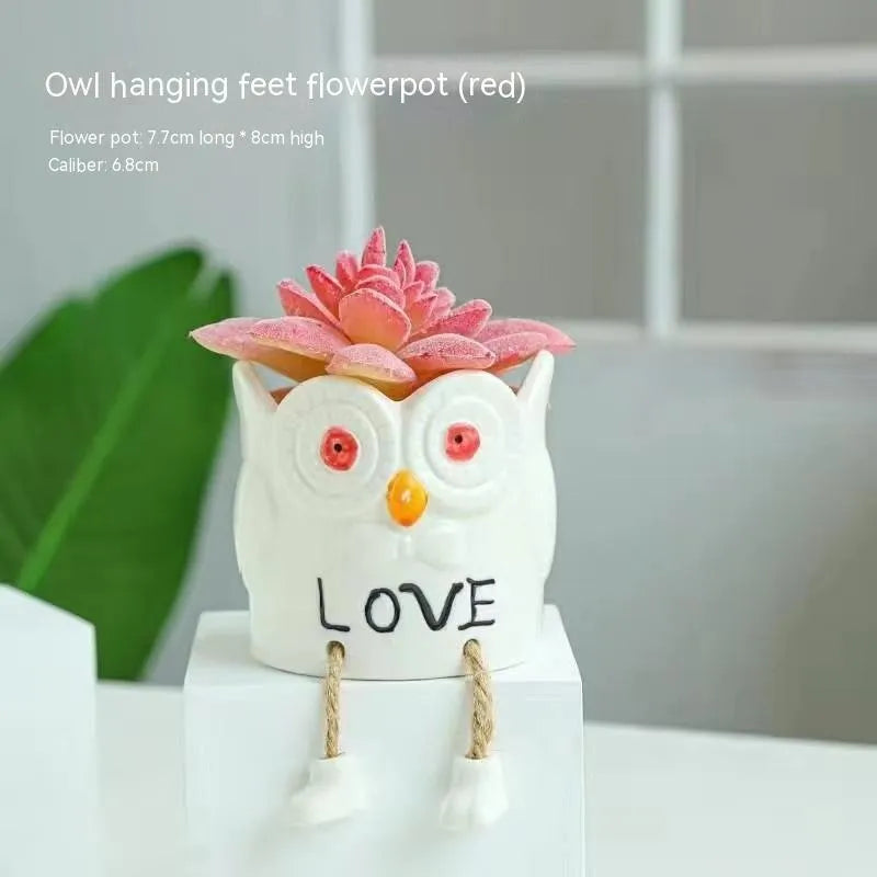 Ceramic hanging foot flowerpot in a cartoon style for desktop succulents.