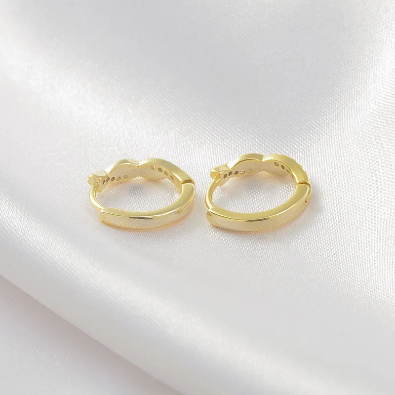 Geometric hemp rope earclip earrings in gold or silver copper with diamond treatment and round elements