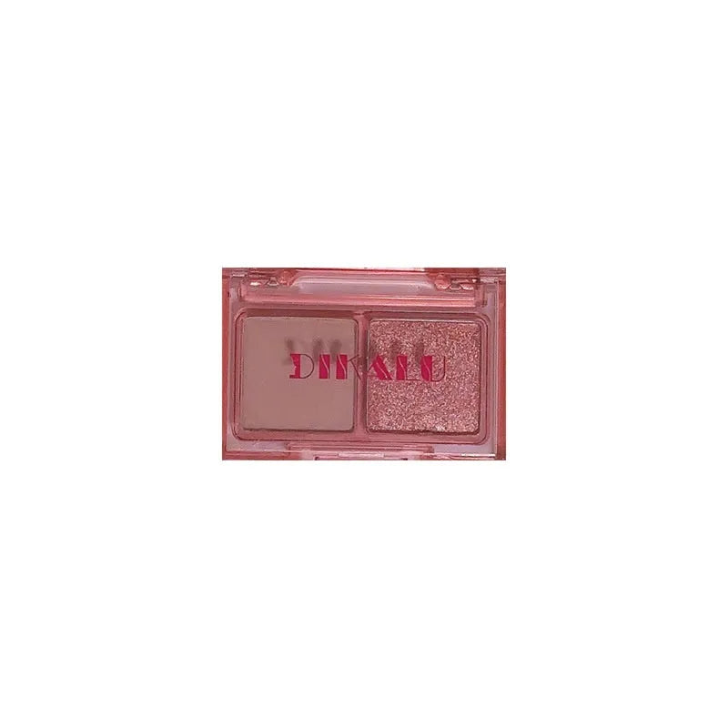 Two-tone eyeshadow palette showing five colour combinations including pink and black shades