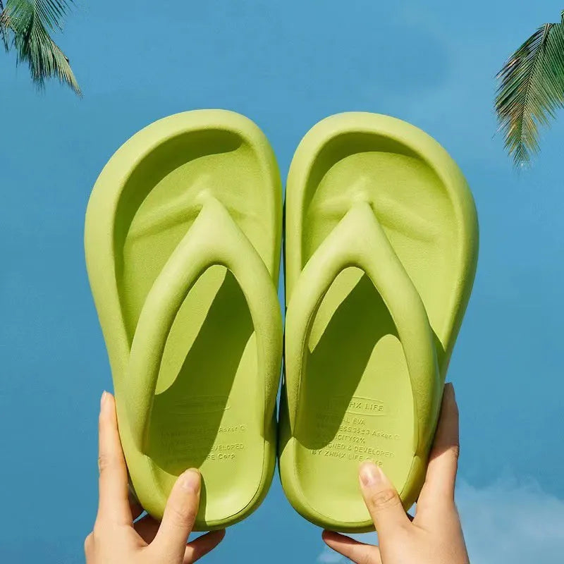 Solid colour thick-soled EVA flip-flops with a bow on the strap, shown on a white background.