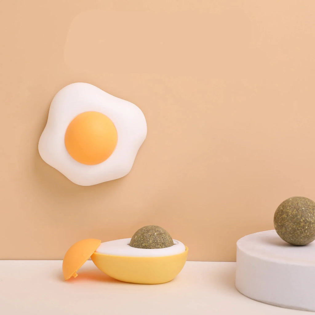 Interactive catnip ball toy with soft plush construction in fried egg and poached egg sizes