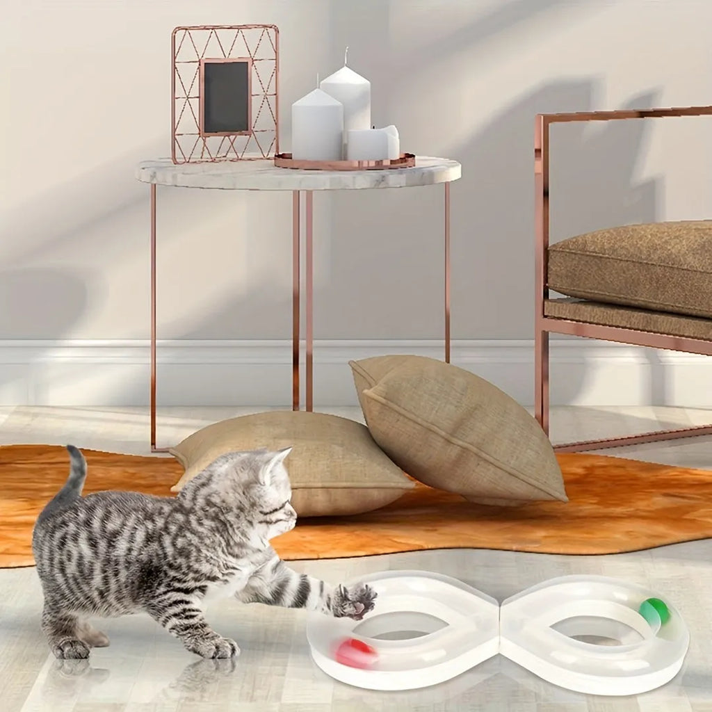 Rotating cat track toy with rolling balls and teasing stick on blue background