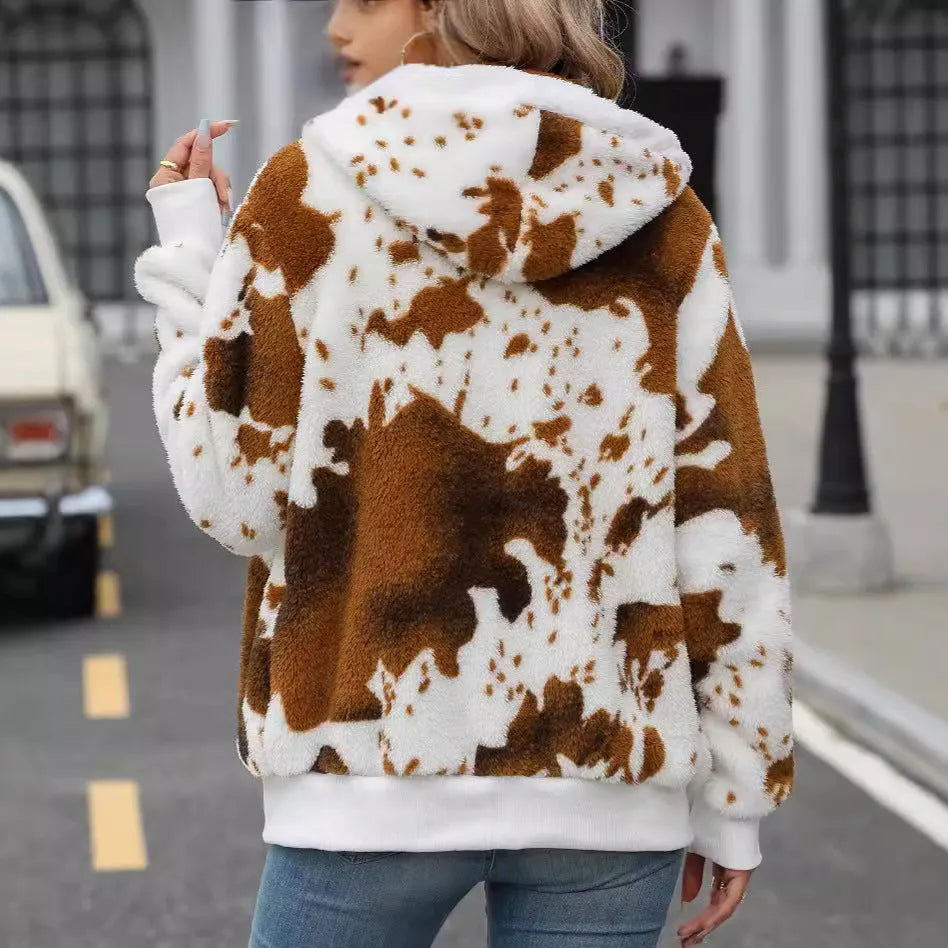 Yellow brown cow animal print pattern on a hooded zip-up cardigan jacket for casual street wear.