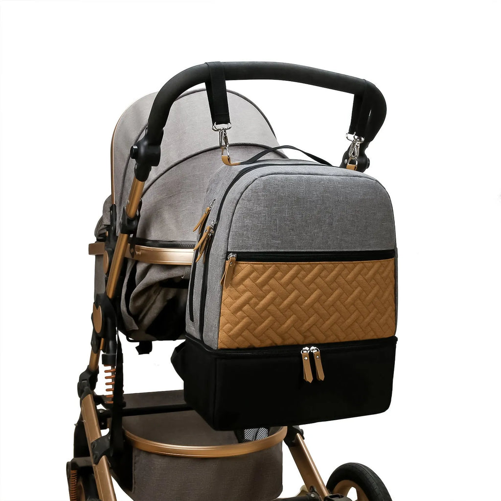 Grey insulated mother and child travel backpack with curved straps and multiple compartments.