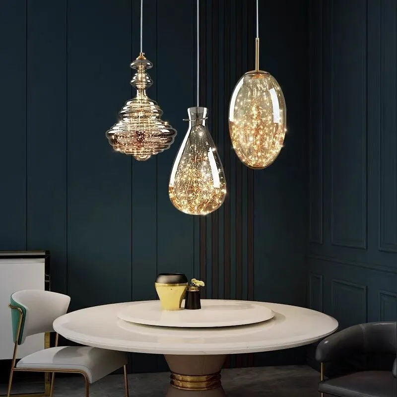 Modern glass droplight chandelier with adjustable height mechanism showing glass construction
