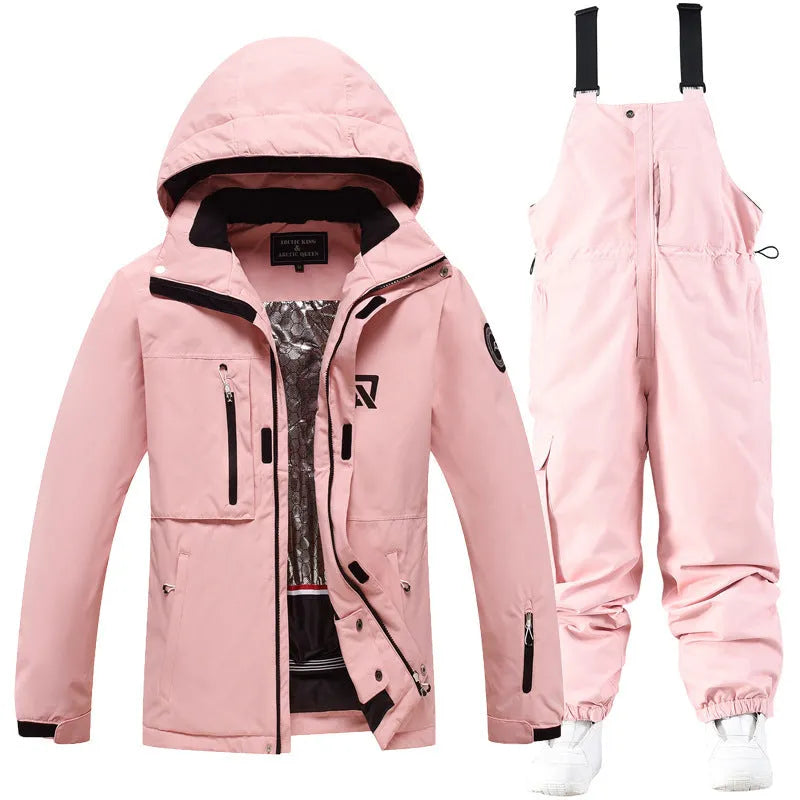 Men's and women's waterproof winter ski suit in blue top with grey blue trousers.
