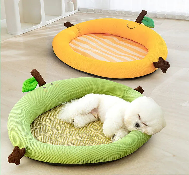 Green pet bed with fruit-patterned backrest, shown in large size for dogs.