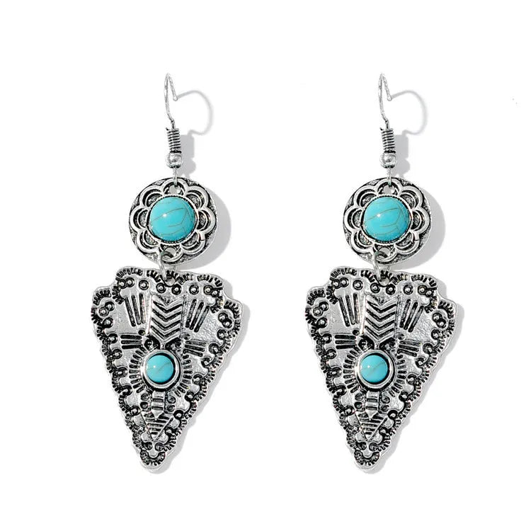 Pair of retro alloy earrings for women in triangle style with national design for travel and photo outfits.
