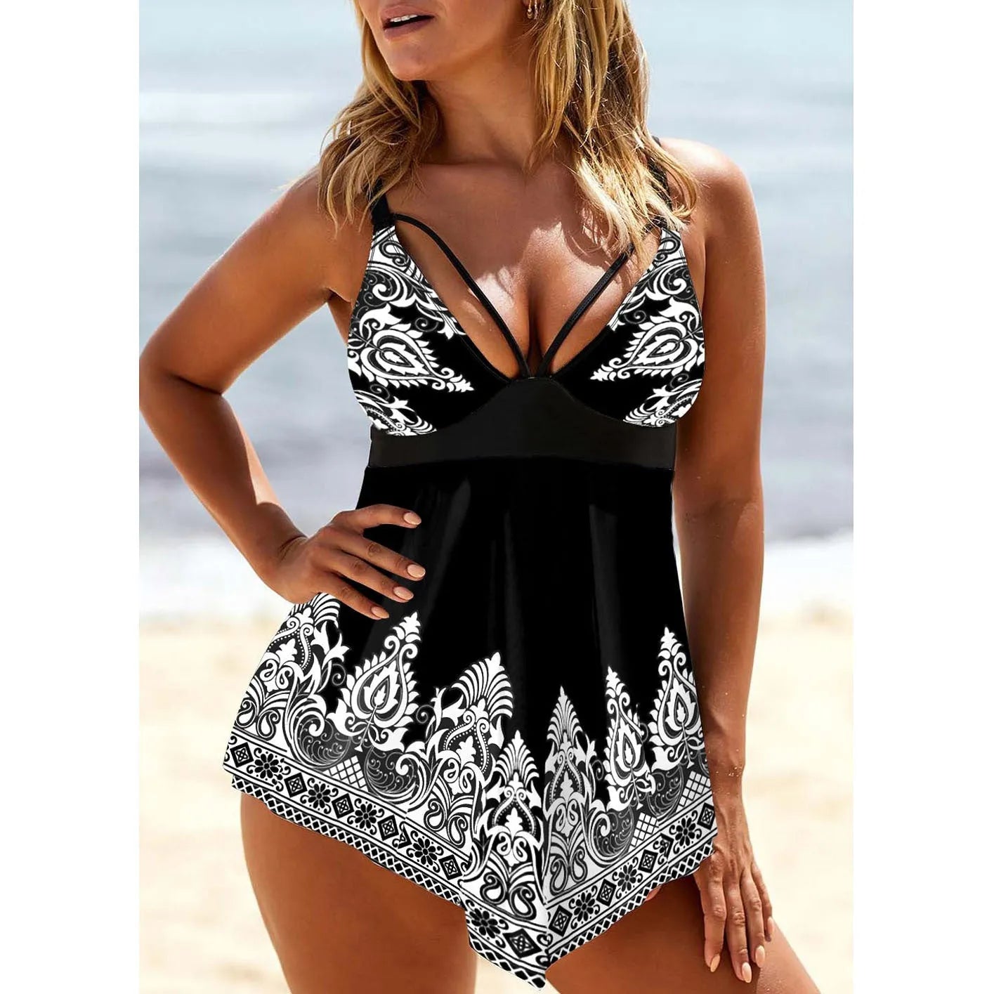 Women's plus size deep V-neck swimsuit with printed straps in a blue colour.