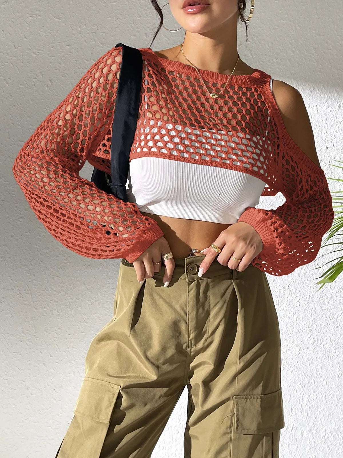 Mesh shirt with a hollowed navel design in a choice of colours including army green, black, and white.