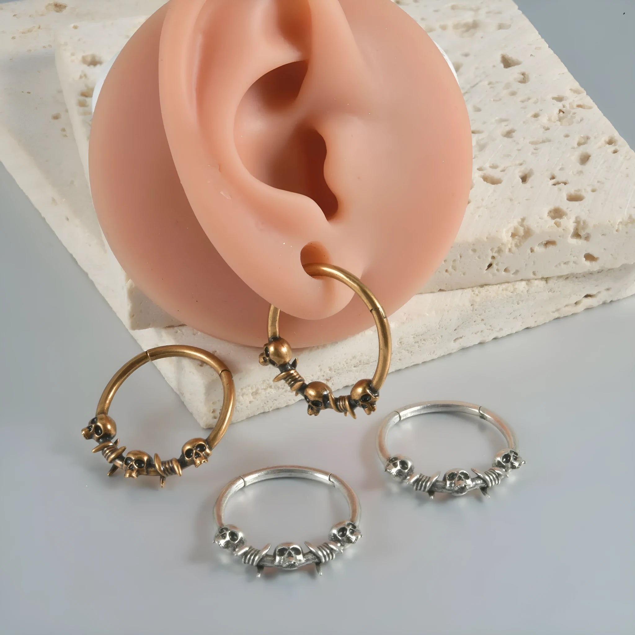 Copper punk earrings with vintage ghost head design in antique gold and silver finishes