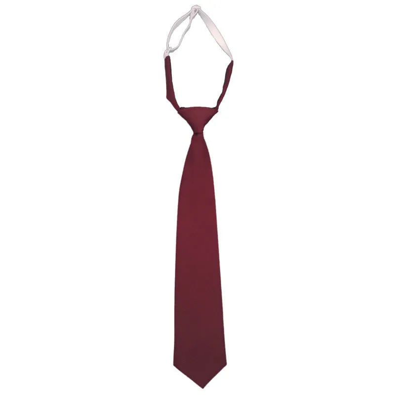 Solid navy blue men's cotton tie with arrow-type design on a white background.