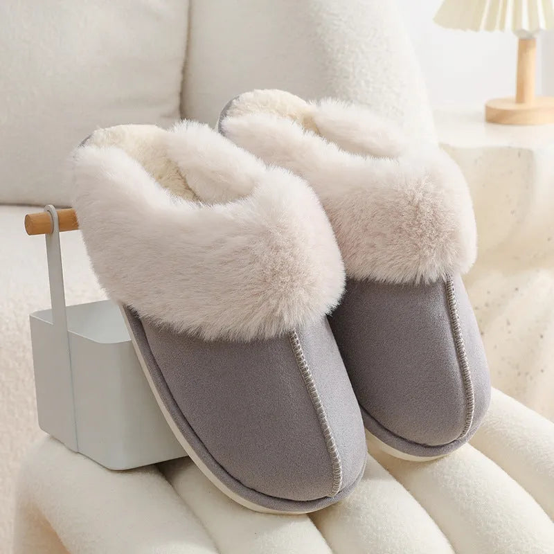 Women's brown plush indoor slippers with artificial wool lining and a textured PVC sole.