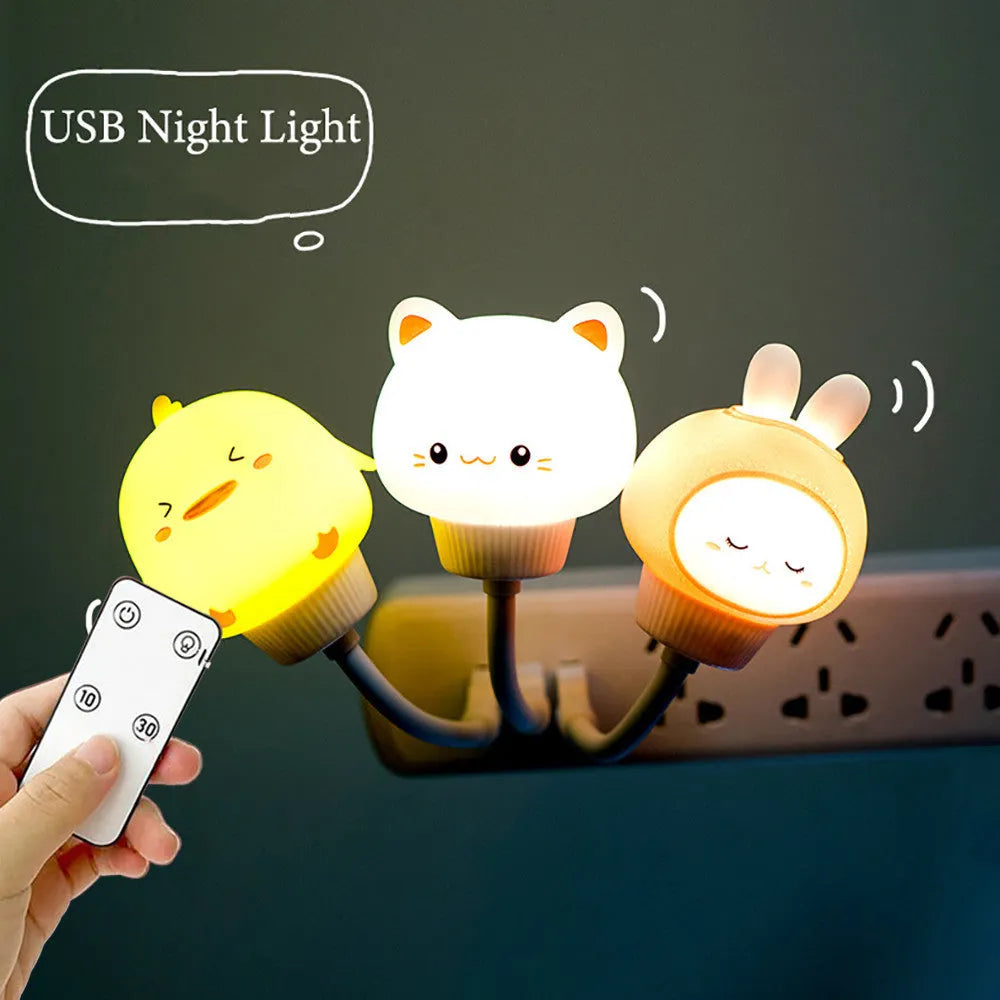 Cartoon bear or rabbit USB LED night light with remote control on a bedside table