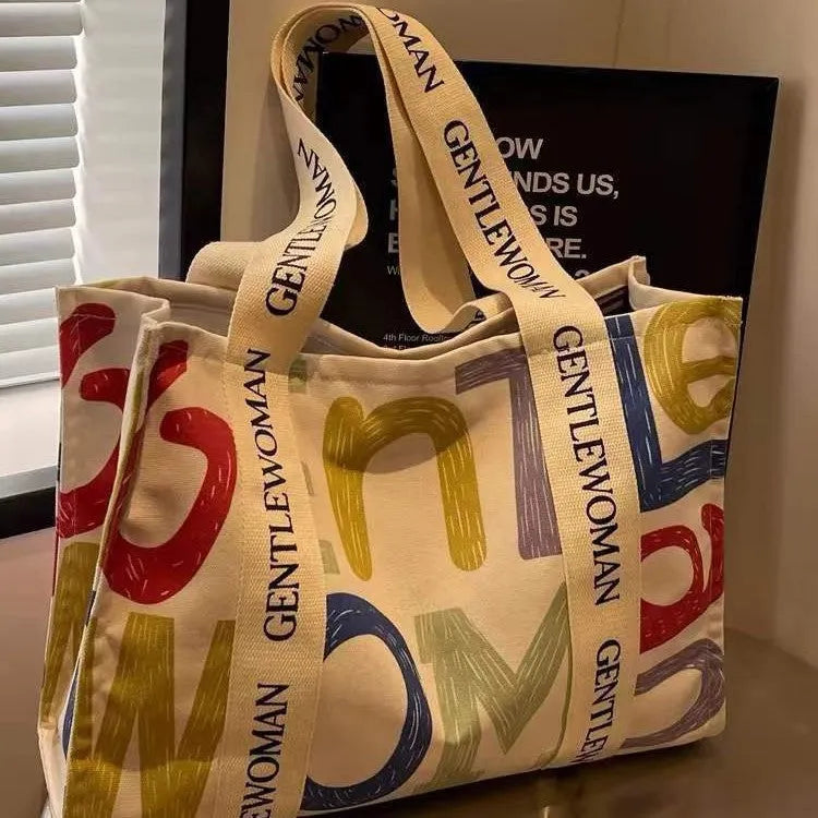 Canvas women's tote bag with printing detail in large capacity design