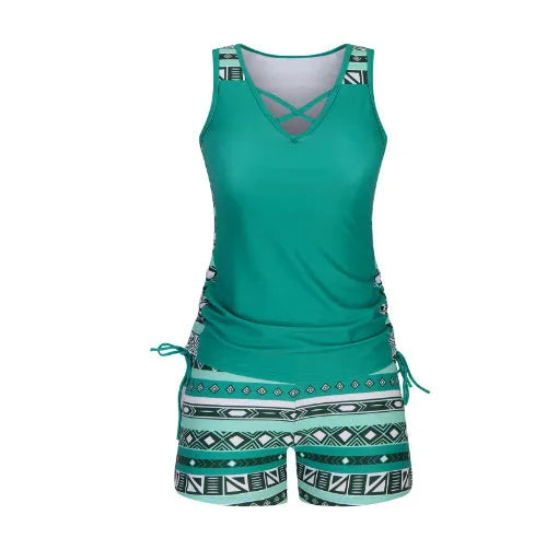 Women's blue printed lace two-piece swimsuit top and shorts laid flat.