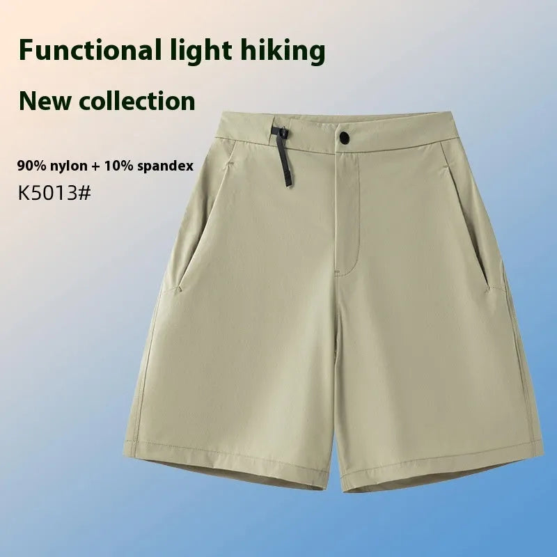 Men's solid colour quick-dry sports shorts with elastic waistband, shown in khaki.