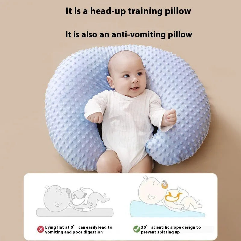 Multifunctional nursing pillow with milk spill prevention in pink colour for breastfeeding support