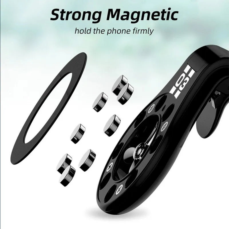 Black universal magnetic car phone holder clipped to a car air vent, holding a smartphone.