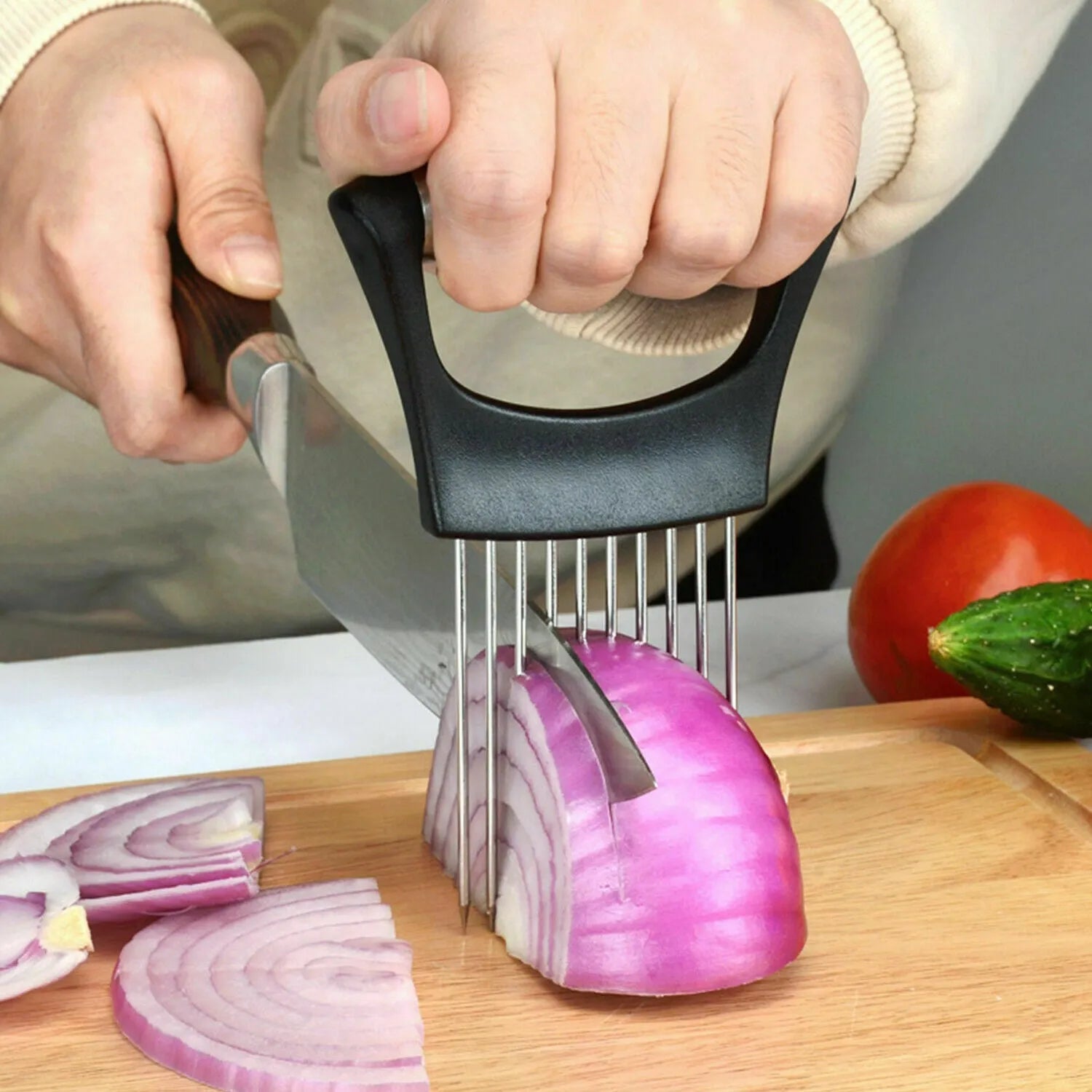 Stainless steel food slice assistant with ABS handle for stabilising onions and tomatoes during cutting