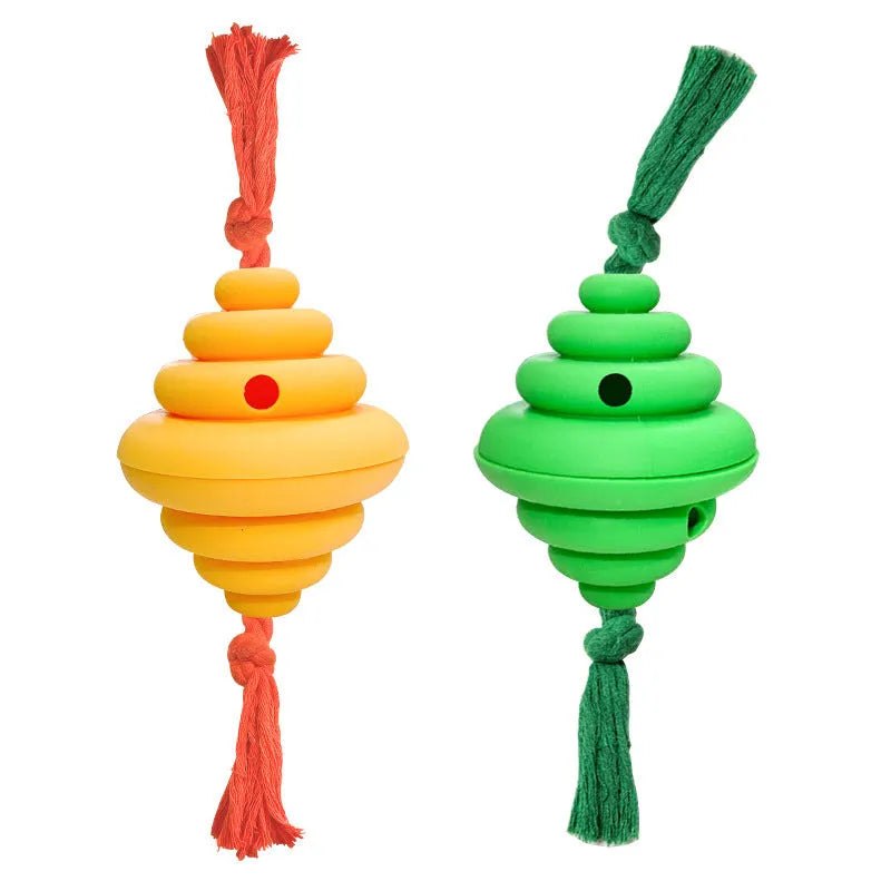 Green and yellow dog ball with attached rope for interactive play and food dispensing