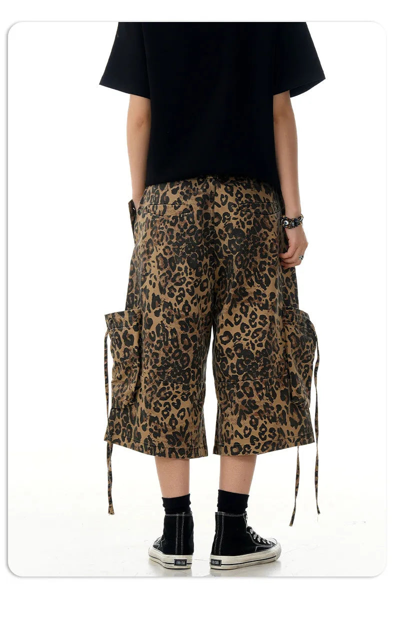Women's leopard print cropped trousers with high waist and straight leg cut