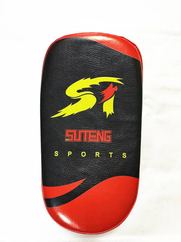 Black and red hand-held martial arts target pad with buckle strap on the back.