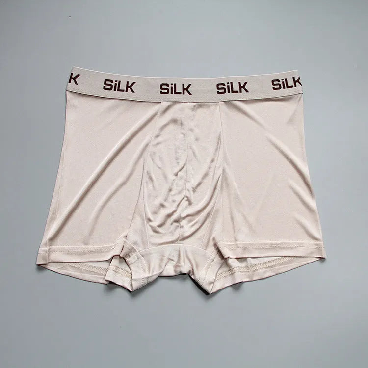 Men's silk shorts in navy blue with mid waist design and loose fit