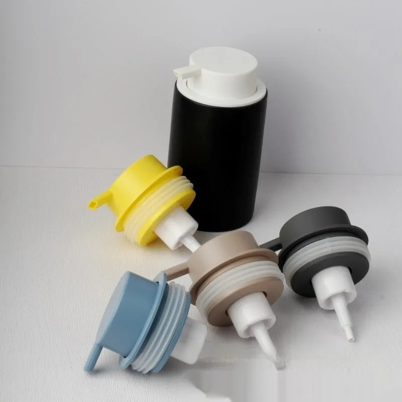 ABS plastic facial cleanser foam pump dispenser with large pump head in metallic finish