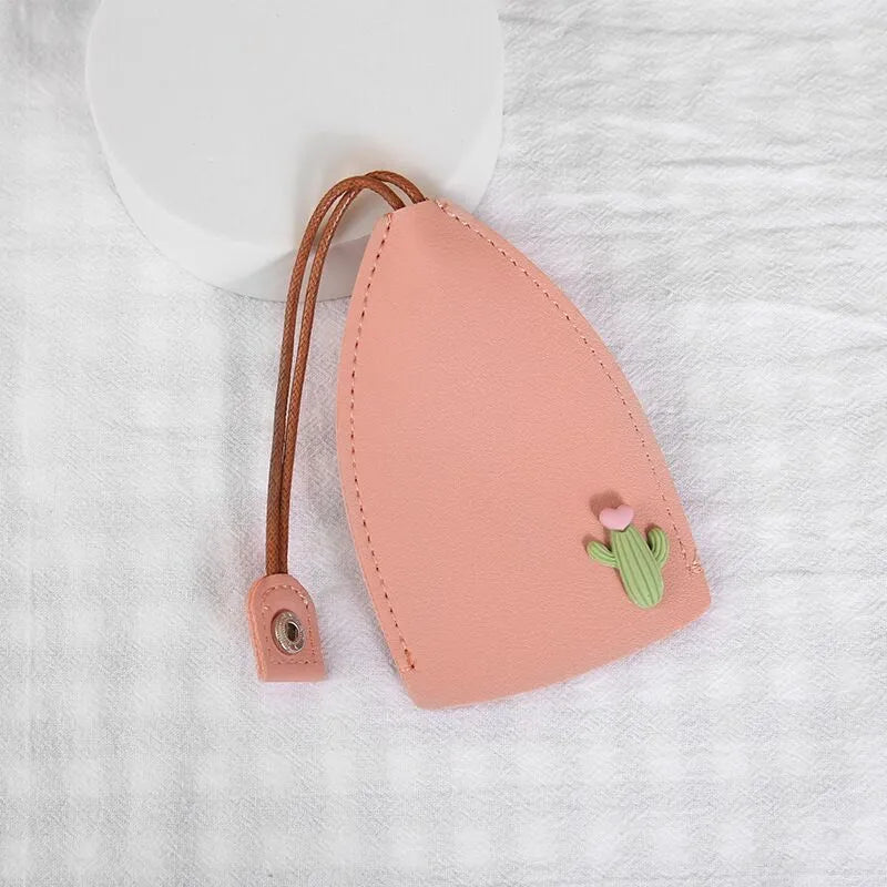 Colourful cartoon pull-out key case for car keys with PU leather construction