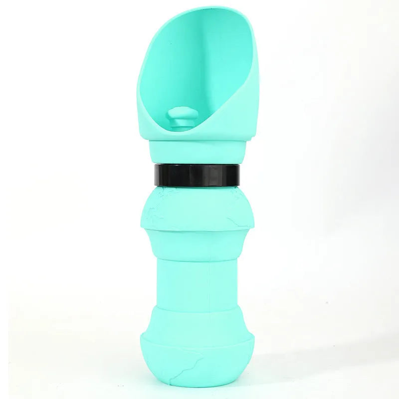Collapsed and unfolded views of a silicone pet folding water travel bowl in mint green.