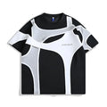 Loose fit black short sleeve T-shirt showing detail of double-layer stitched padded shoulder strap.