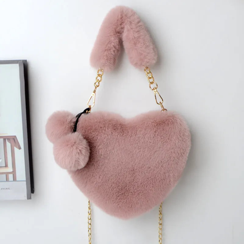 Soft plush heart-shaped women's handbag in medium size with zipper closure