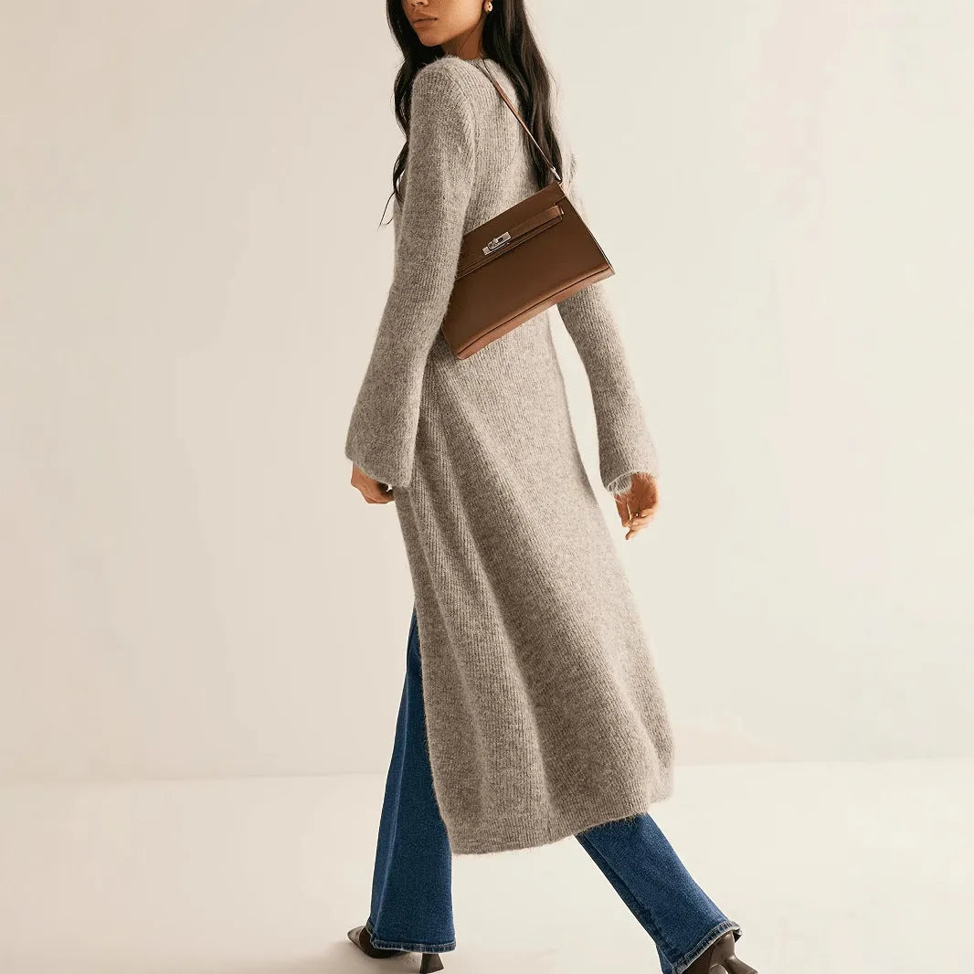 Khaki long sleeve coat cardigan with button front in a retro French style.