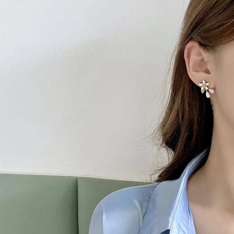 Alloy camellia flower earrings with sterling silver needle detailing for women