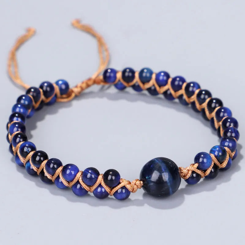 Handmade woven geometric pull bracelet with Tigereye stone beads in blue or amethyst colours