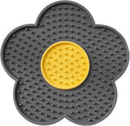 Flower-shaped silicone lick pad for cats and dogs with multiple suction cups on the back, shown in a choice of colours.