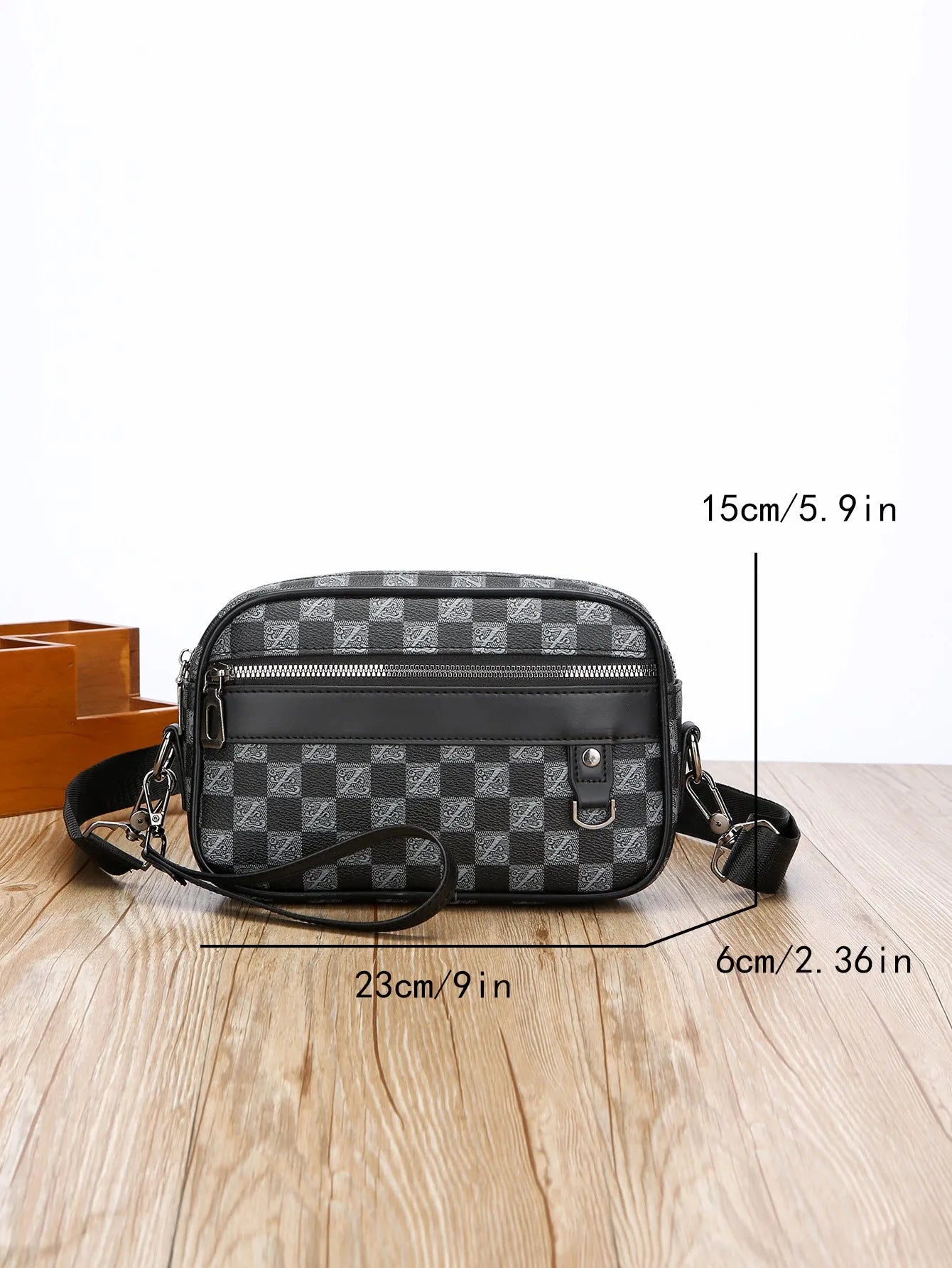 Men's geometric pattern messenger bag with shoulder strap and handheld option in black colour